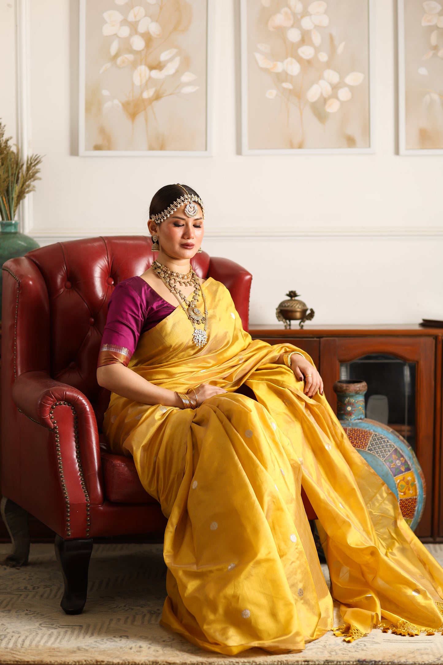 Yellow pure chanderi silk handwoven saree with thin zari border and meenakari buttis, front long angle