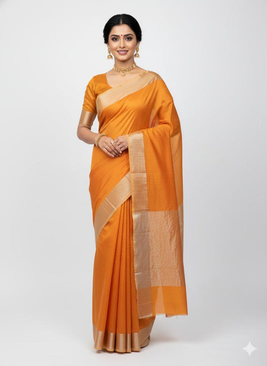 Woman wearing an orange saree with a white background